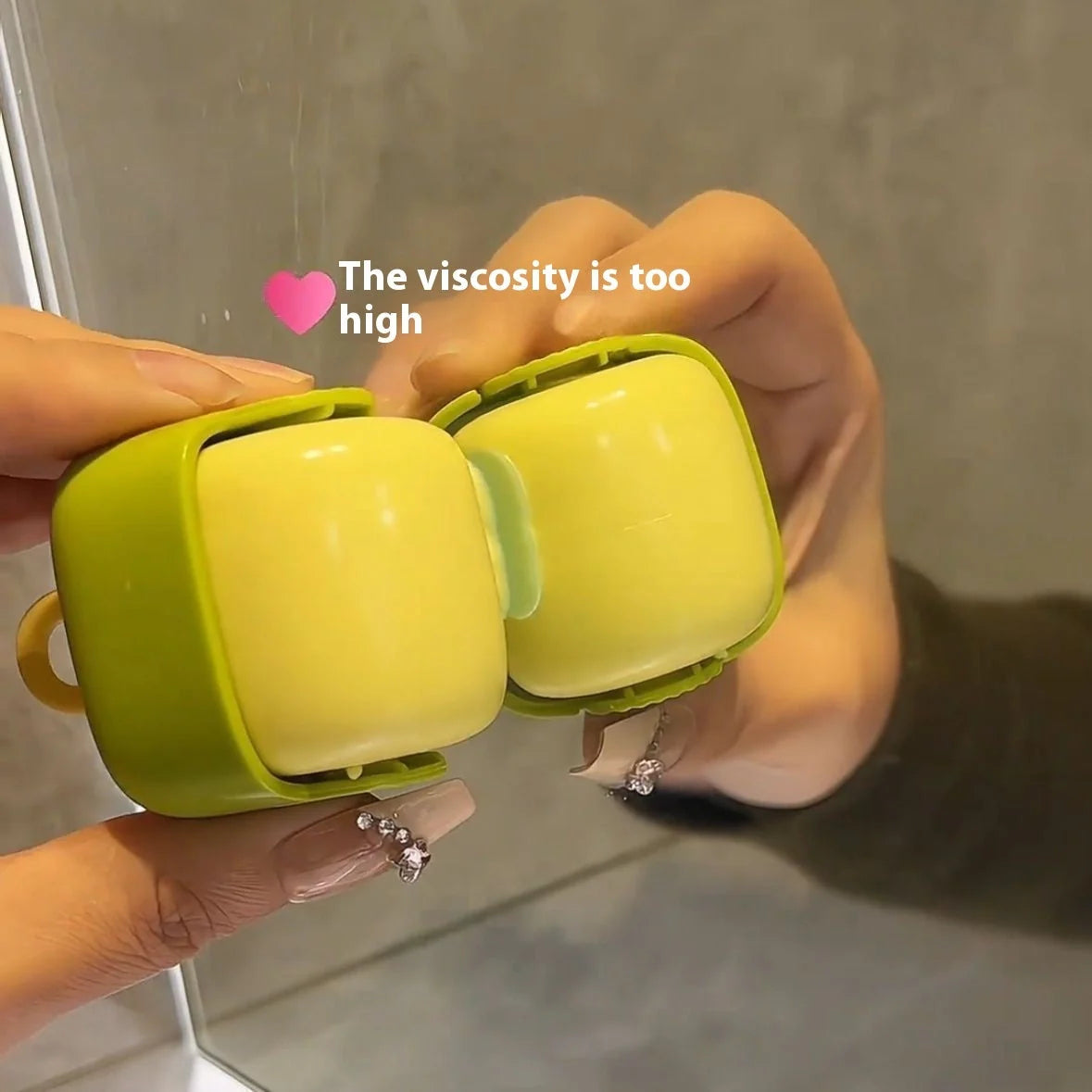 Green and yellow portable lint remover ball with ABS TPE material for gentle fabric care