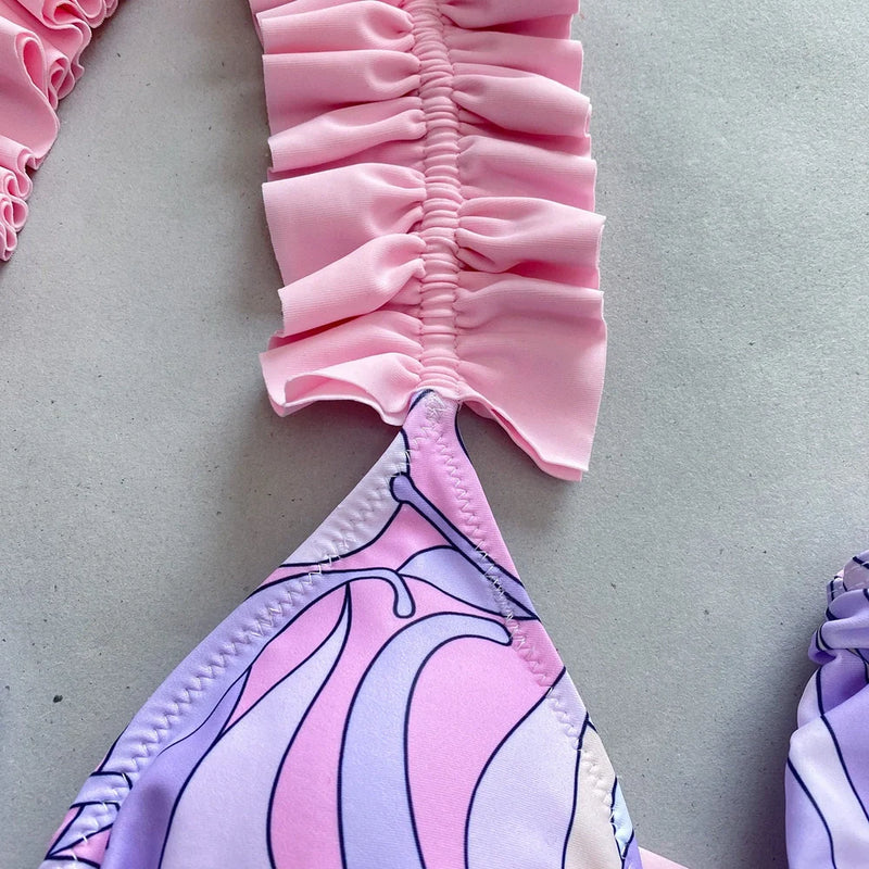 Women's bikini pleated split swimsuit with 82% nylon lining and four-way stretch fabric for swimming and fitness activities in four colour options