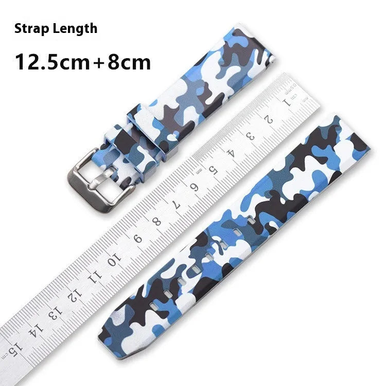 Green camouflage silicone watch strap with flat head universal lugs on a grey background