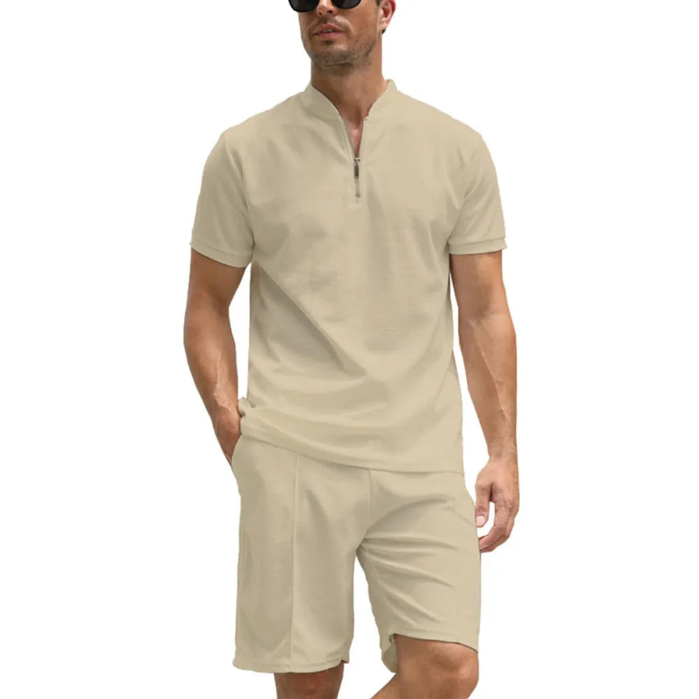 Men's solid colour polo shirt and trousers two-piece casual suit set on a hanger.