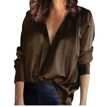 Women's green satin long-sleeved shirt with nine-quarter sleeves on hanger