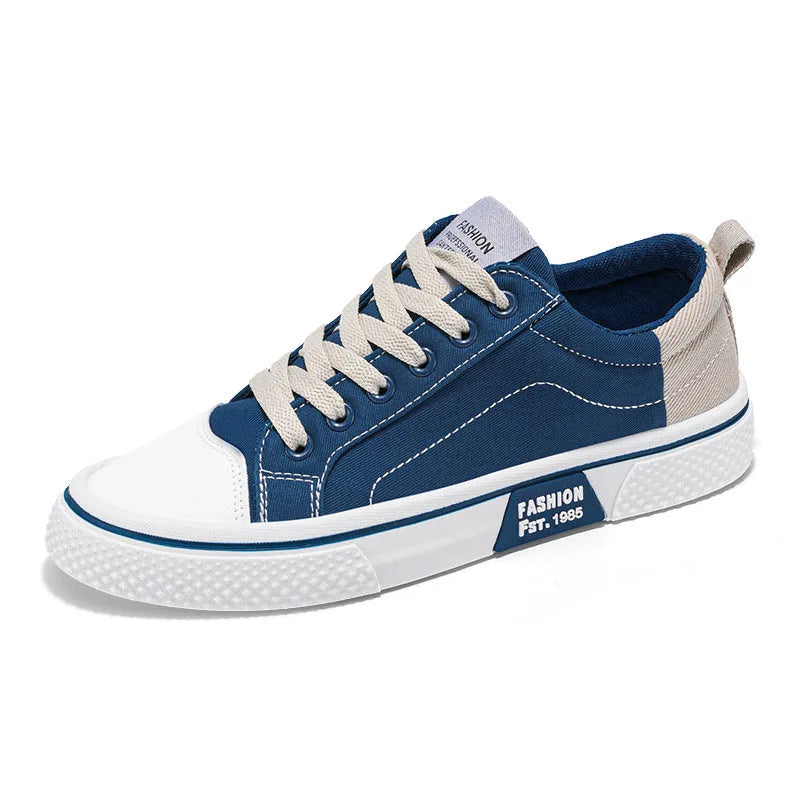 Men's blue canvas casual shoes with round toe and lace-up front, showing PVC sole detail
