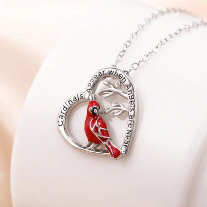 Heart shaped cardinal pendant necklace with silver water wave chain