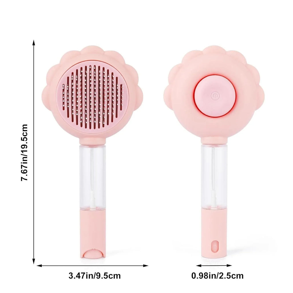 Grey spray cat brush with release button next to a cat, showing curved stainless steel bristles.