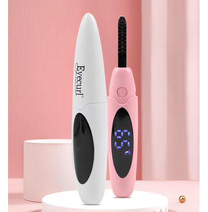 Pink USB-charged electric eyelash curler with curved brush head and LED indicator
