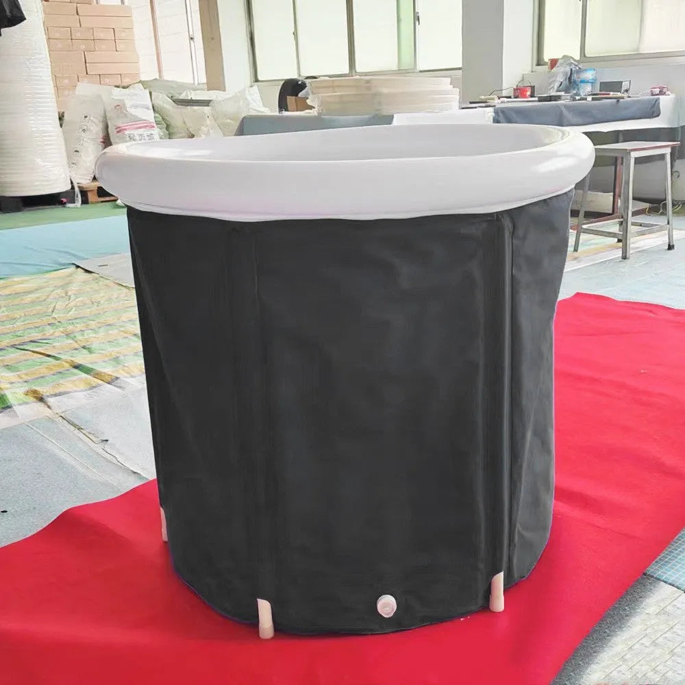 Black inflatable PVC ice bath tub measuring 70x80cm with weather lid and insulation for cold therapy