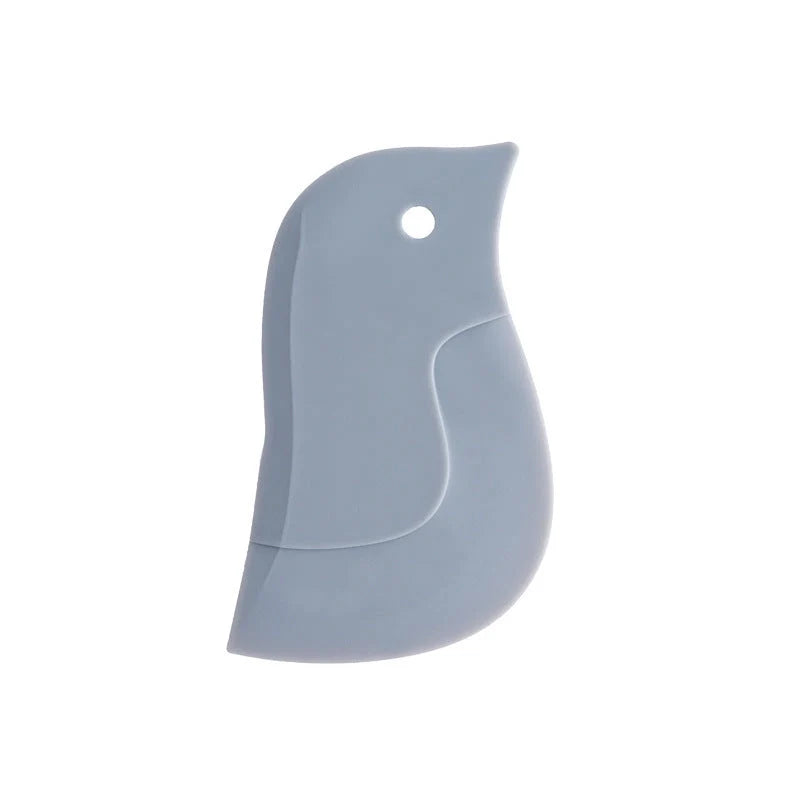 Penguin-shaped kitchen scraper for efficient plate and pot cleaning