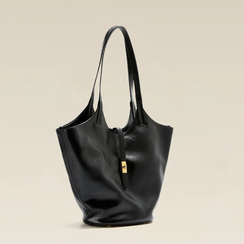 Black genuine leather bucket bag with sewing thread detail and single shoulder strap