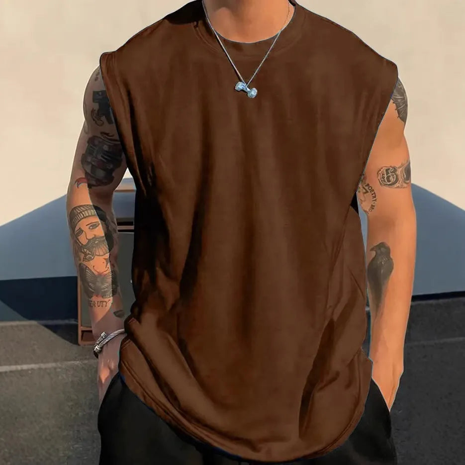 Men's loose solid colour cotton tank top t-shirt on a hanger, showing straight hem and sleeveless design.