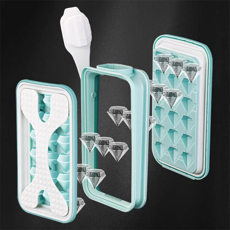 Silicone ice ball mould bottle in light grey, showing integrated ice tray and bottle with lid.