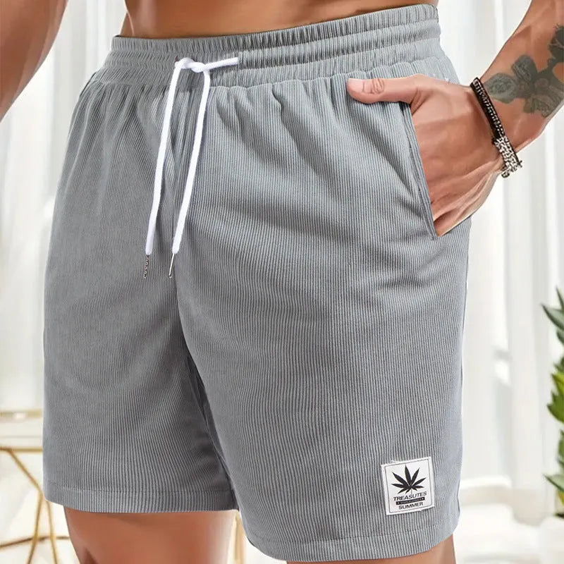 Men's grey drawstring summer leisure shorts on a white background.