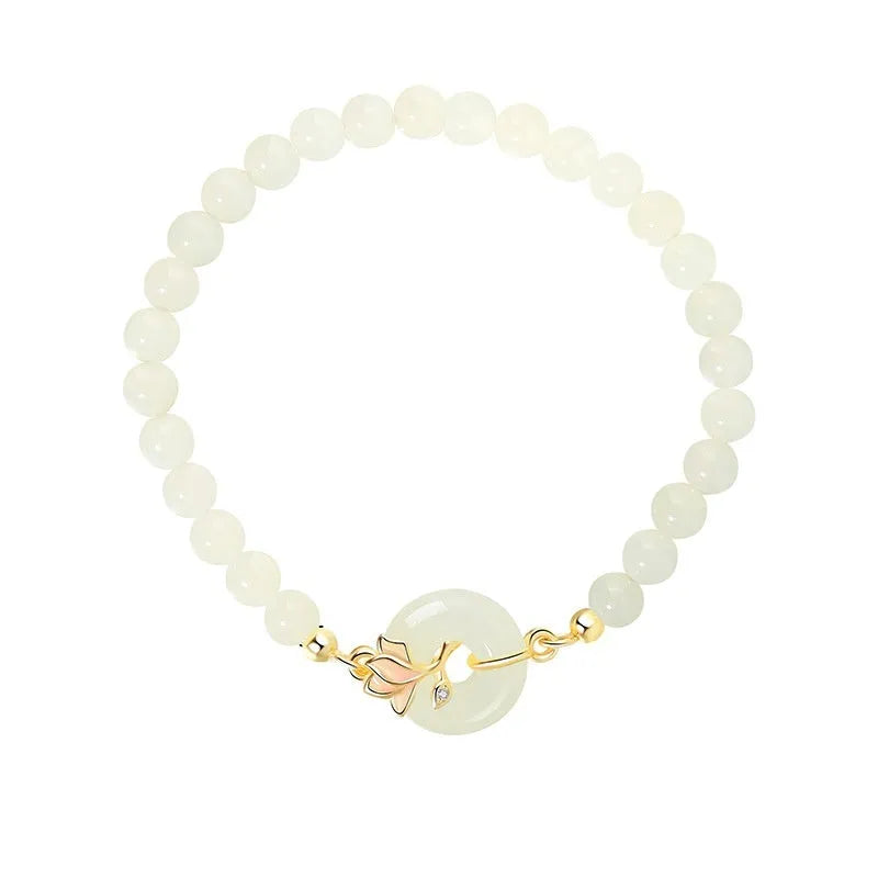 Orchid Hetian jade S925 sterling silver magnolia round beads bracelet on display