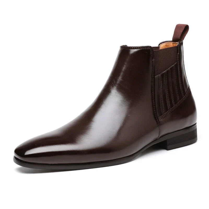 Sophisticated pointed-toe Chelsea boots with square heels, crafted from premium artificial leather for modern gentlemen's fashion