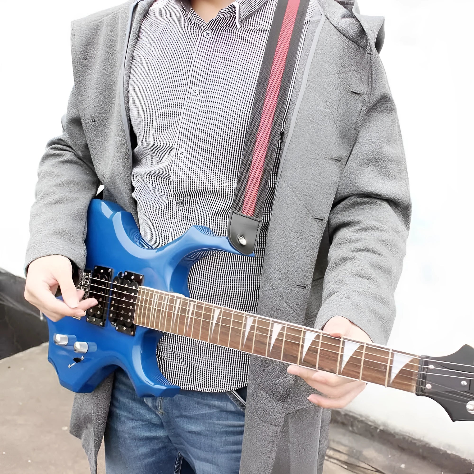 Universal woven crossbody instrument strap for guitar, bass, and ukulele in five colour options.