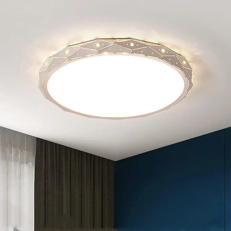 Round black iron frame LED ceiling light with dimming control on a white ceiling