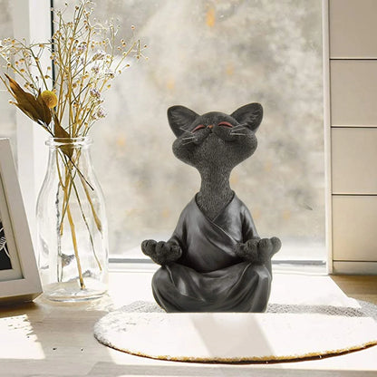 Charming ceramic Buddha cat figurine in black, grey, and orange colors for meditation, yoga, and home decor