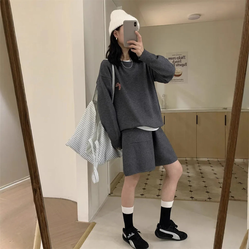 Women's knitted sweater and shorts suit in imitation cashmere with animal embroidery, shown in milk blue.
