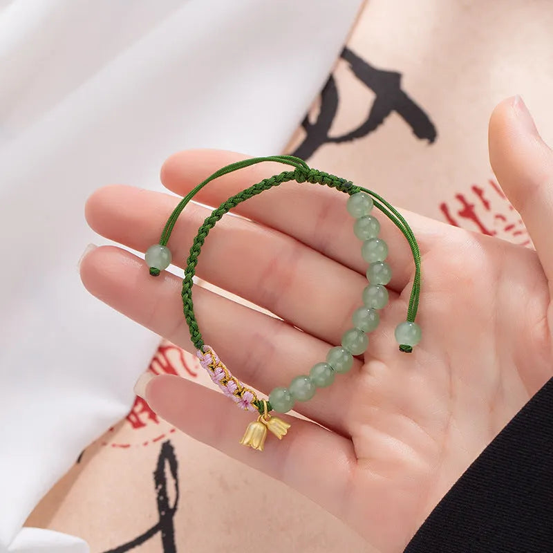 Red rope hand-woven bracelet with lily carrying strap design and national style floral elements for women