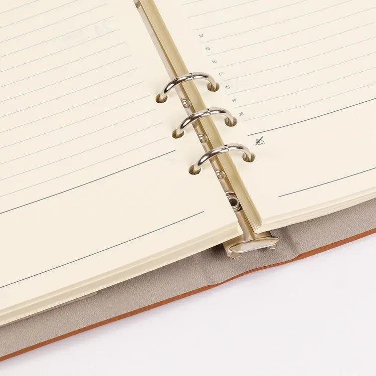White A5 loose-leaf notebook inner pages with monthly plan layout on paper