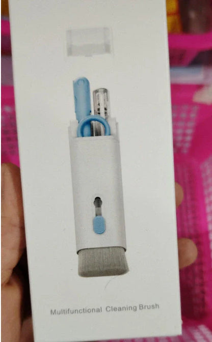 Pink and blue computer cleaning pen set with brush, keycap tool, and empty spray bottle