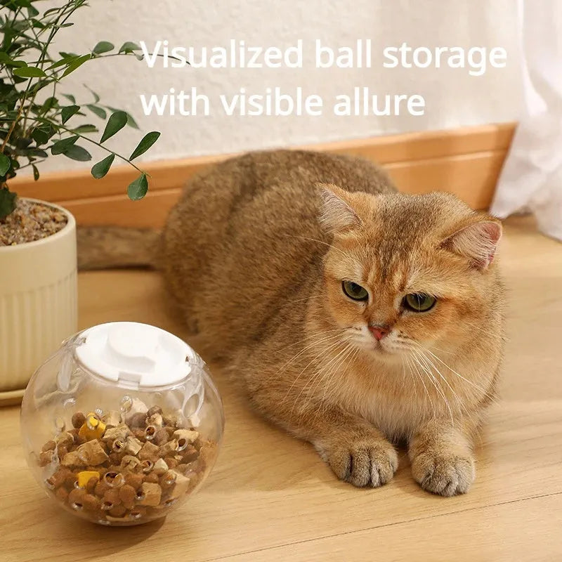 Blue slow feeding ball for cats with visible food compartment, 11.5cm diameter