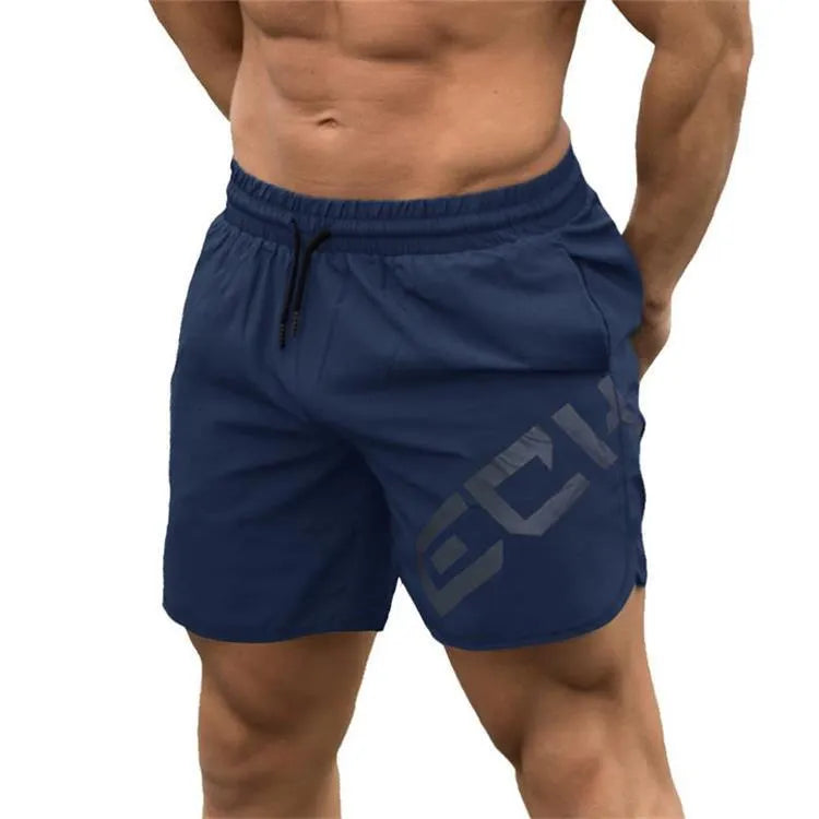 Men's black elastic nylon quick-dry running shorts on a mid-waist, knee-length model.