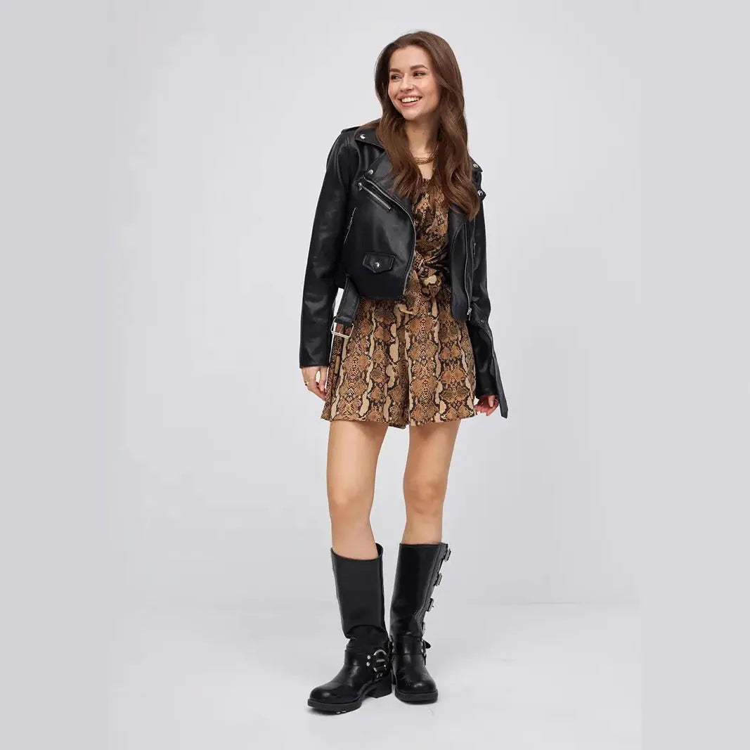 Black women's retro-style imitation leather locomotive jacket with regular sleeves.