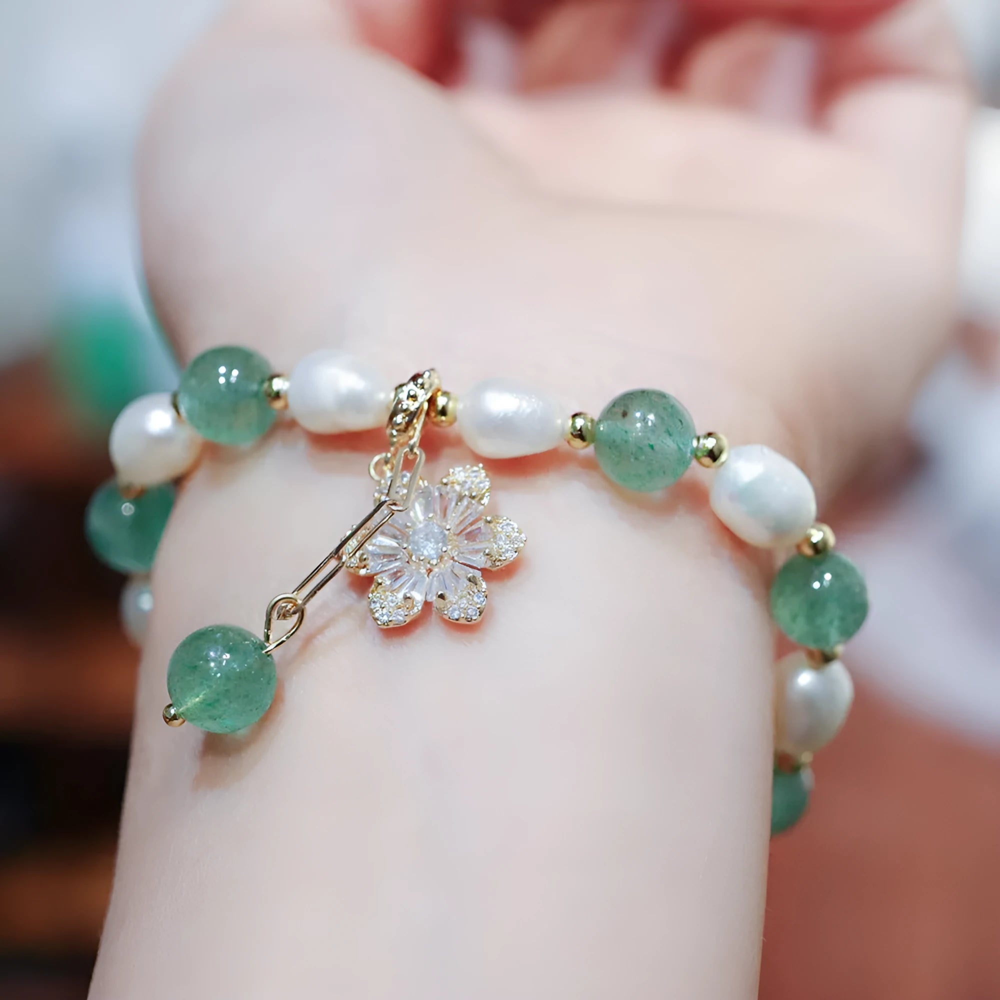 Green strawberry freshwater pearl bracelet with Chinese geometric patterns and peace buckle clasp