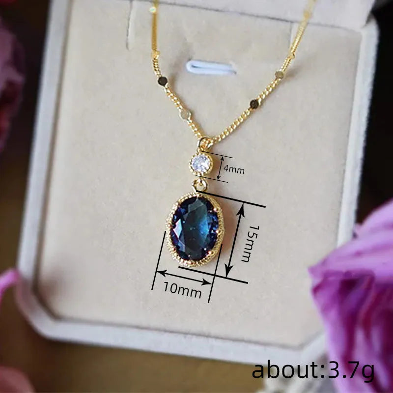 Gold geometric pendant necklace on a chain, French retro style.