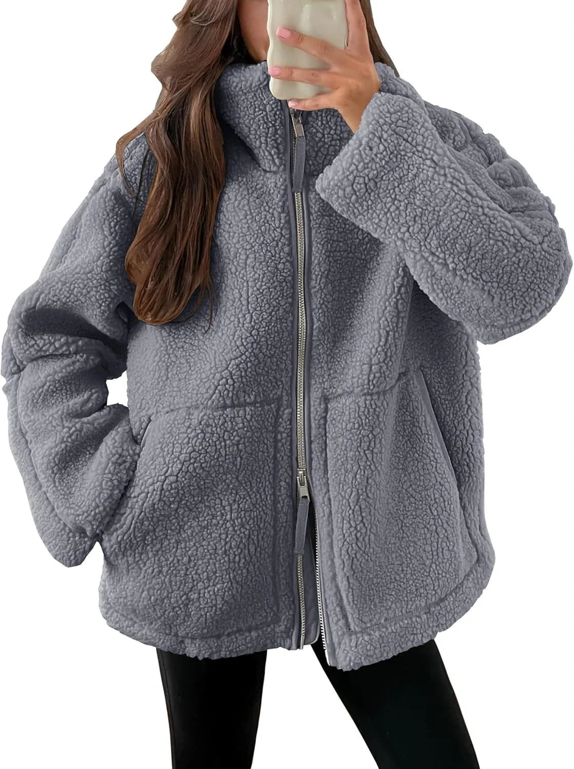 A versatile fleece jacket with a stylish lapel design, practical side pockets, and a cozy long-sleeve silhouette for cold-weather wear.