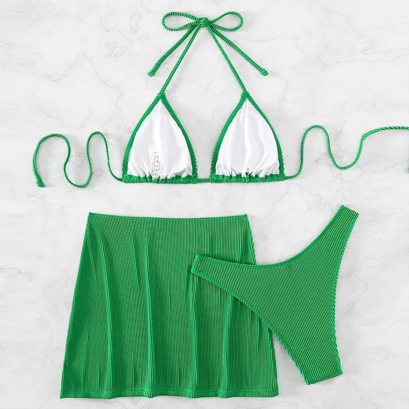 Three-piece ribbed fabric bikini swimsuit set on a hanger