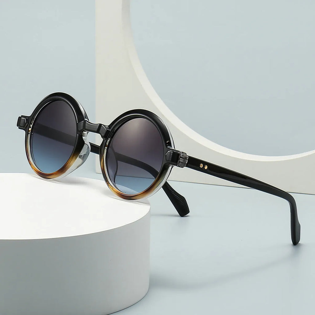 European American retro artistic round sunglasses with black frame and gray lenses, full-frame plastic design