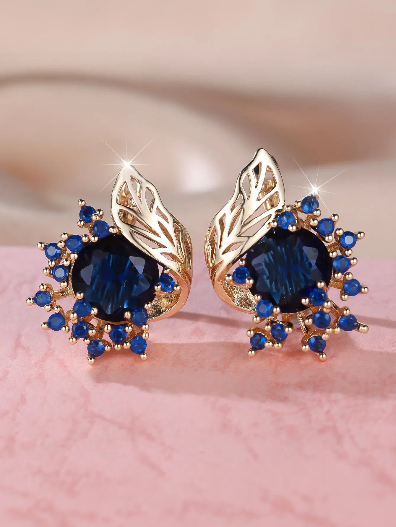 Round flowers feather zircon earrings with electroplated champagne gold finish and colourful diamond accents