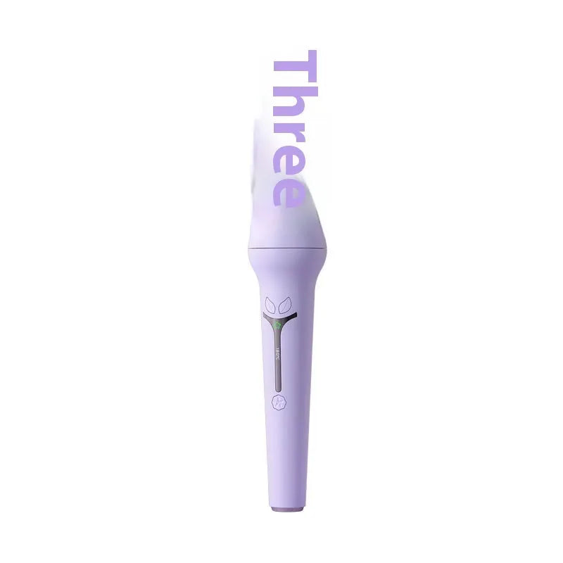 Light purple and pink 32mm automatic hair curler with anion technology and styling clips.