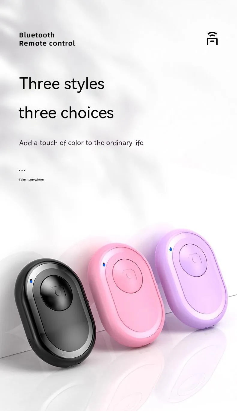 Wireless Bluetooth camera remote control in black, pink and purple colours