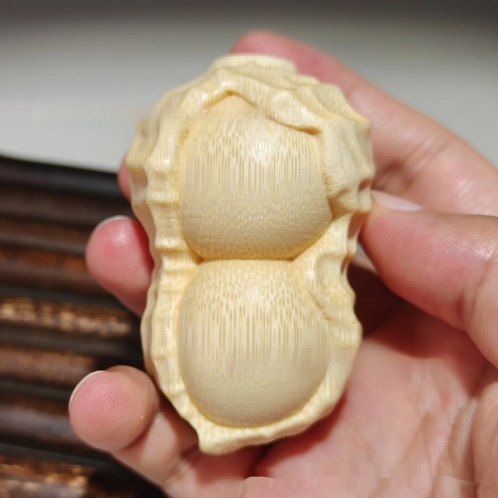 Solid bamboo carving peanut ornament in modern simple style for gift giving