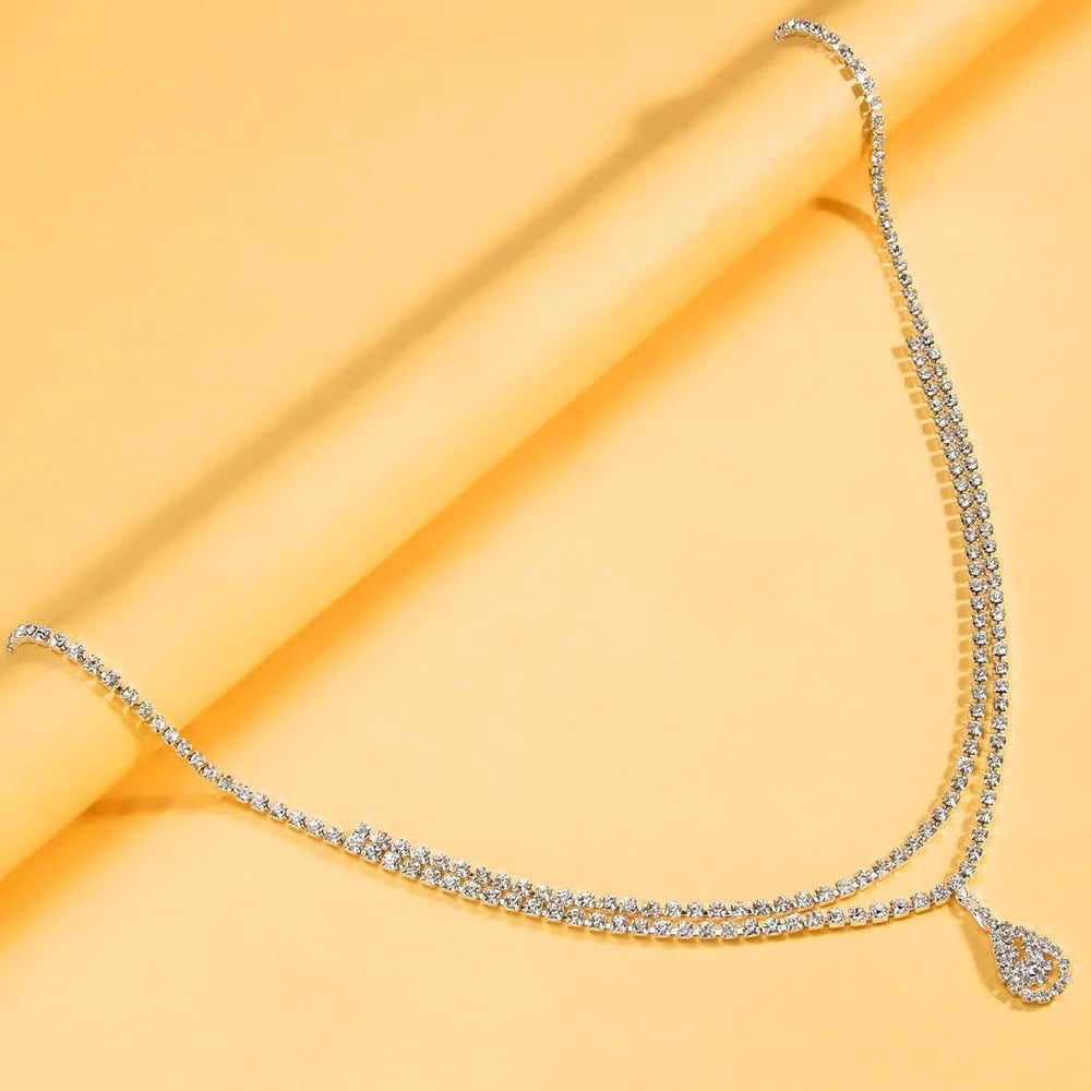 Gold or silver water drop pendant waist chain with 115cm length and lobster clasp fastening