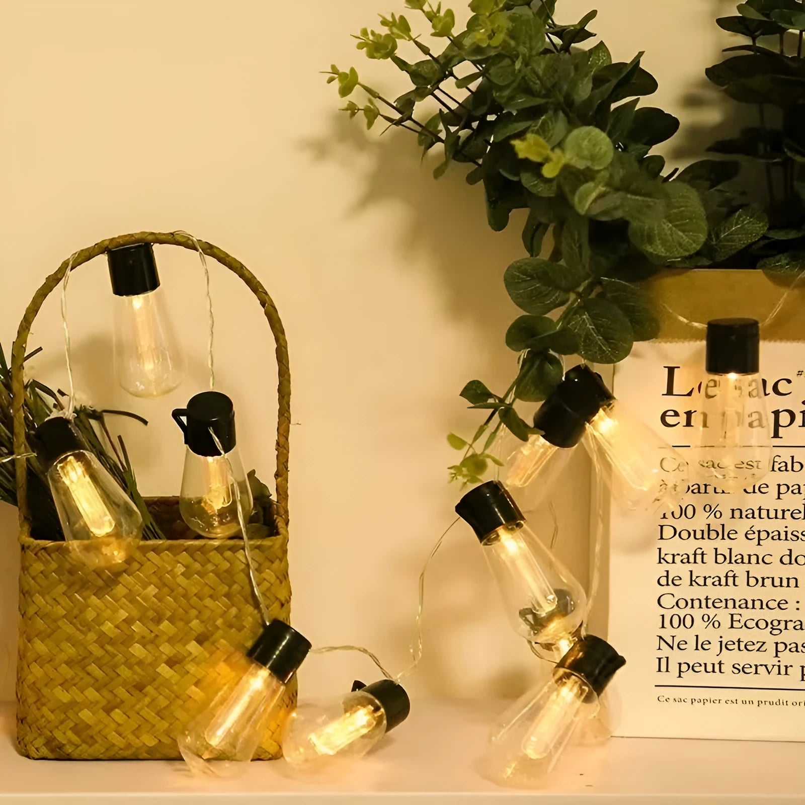 Retro solar outdoor string lights with infusion bottle shape bulbs in garden setting