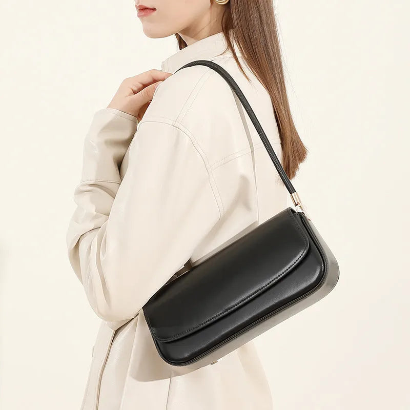 Genuine leather women's saddle bag in caramel, horizontal square shape with double straps