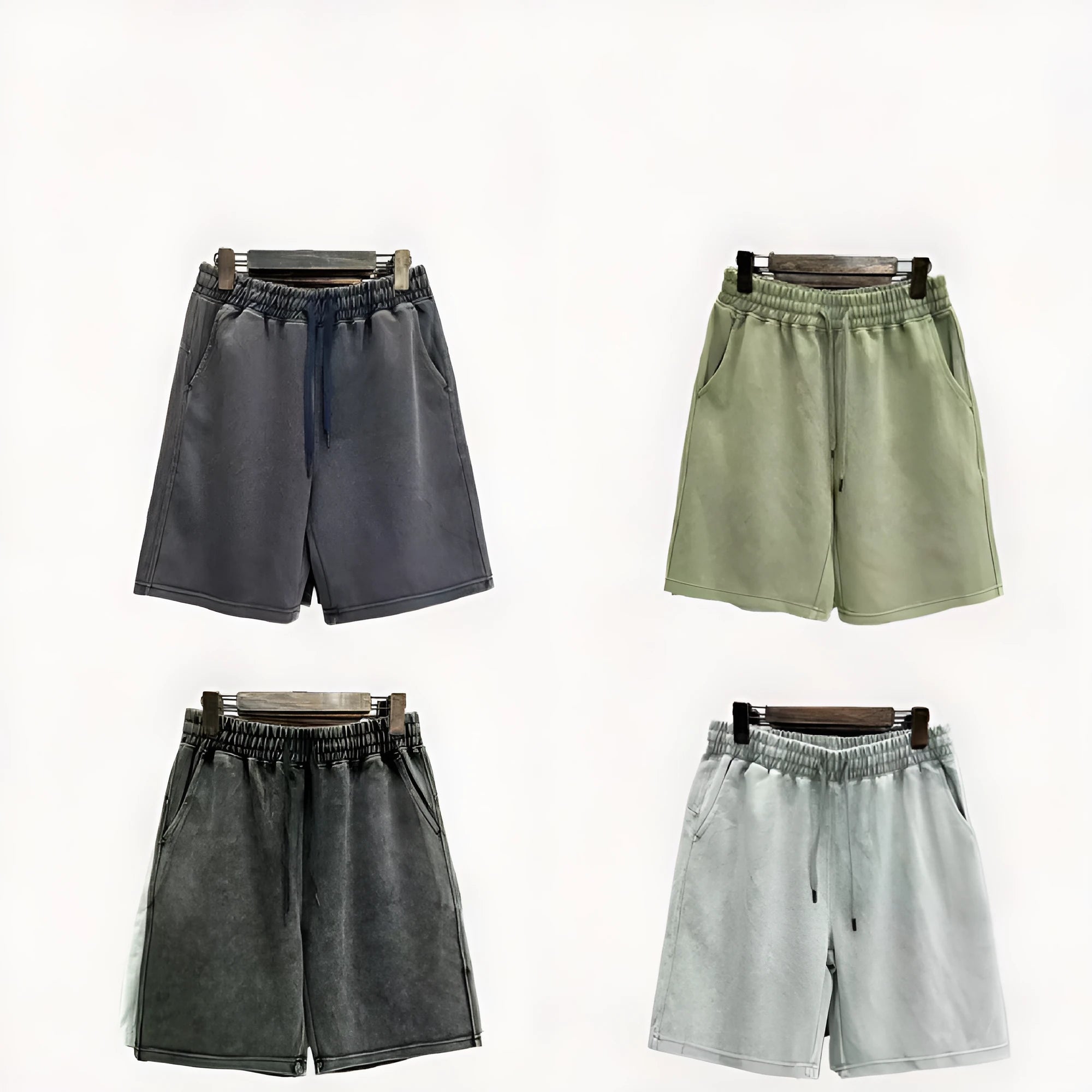 Man wearing navy blue distressed-style casual cotton shorts with a loose straight leg fit.