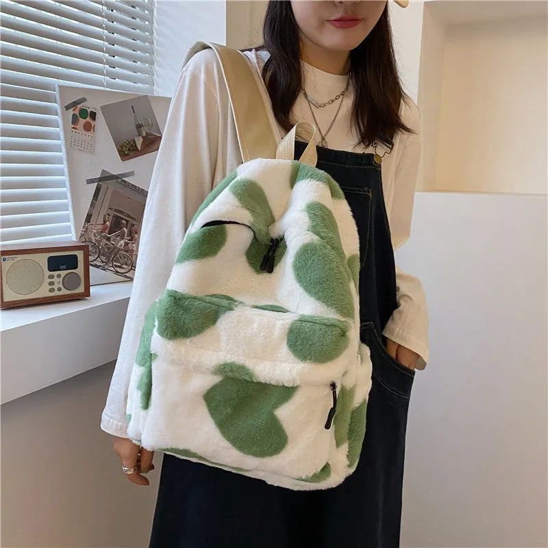 Plush furry backpack in khaki with heart-shaped pattern and front pocket, soft daypack for women