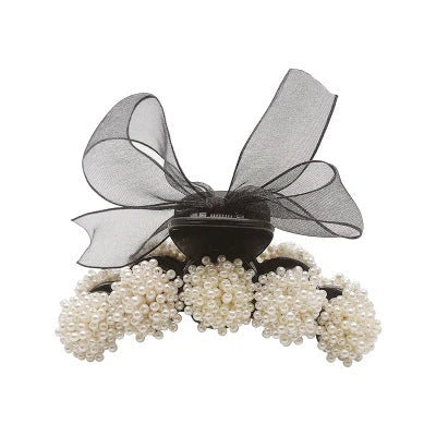 Korean pearl bow hair clip in black with alloy construction and manual bowknot design