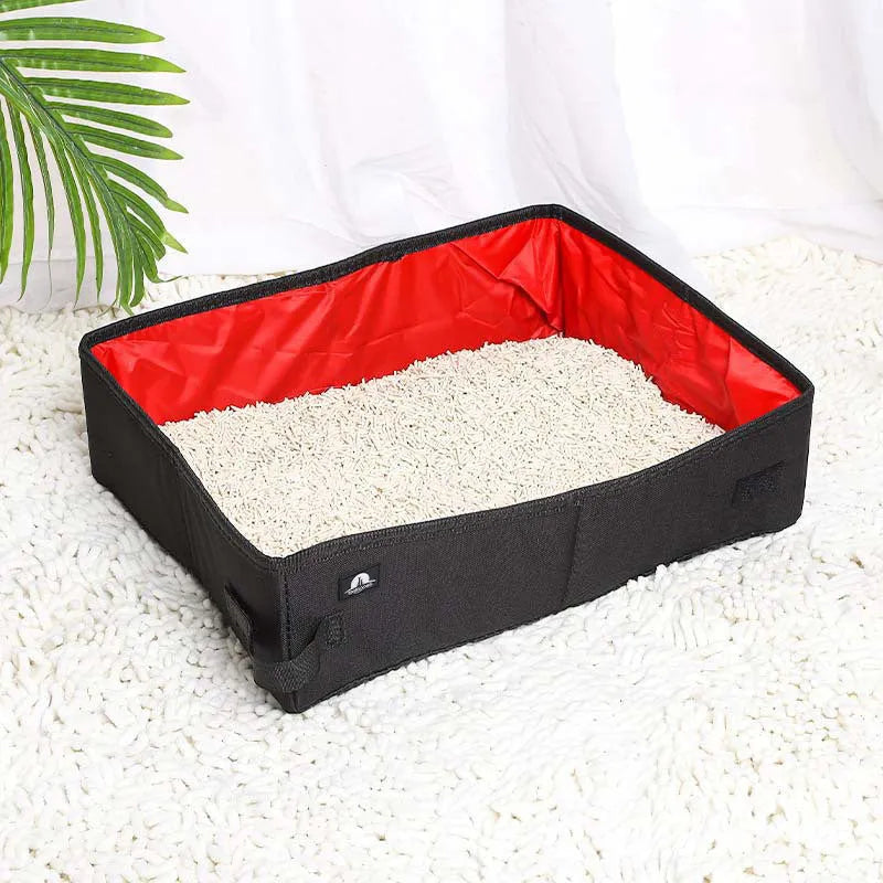 Portable foldable litter box in black Oxford cloth for cats, flat design with open top.