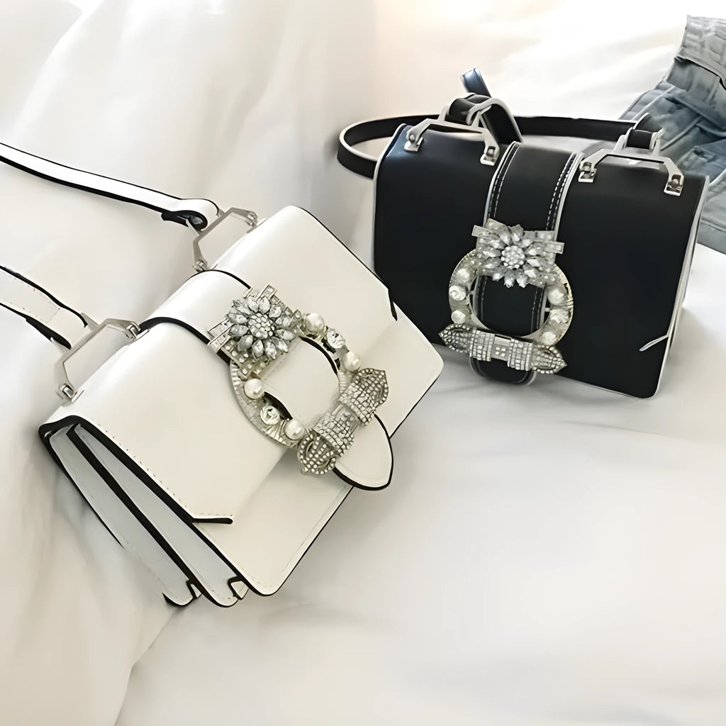 Women's designer diamond lock shoulder bag in quality PU leather, available in Black and Blanco colour options