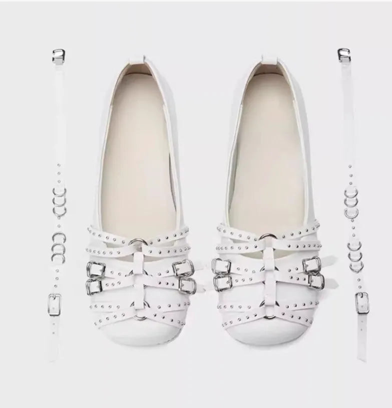 Women's black genuine patent leather retro pumps with a buckle and square toe on a low flat heel.