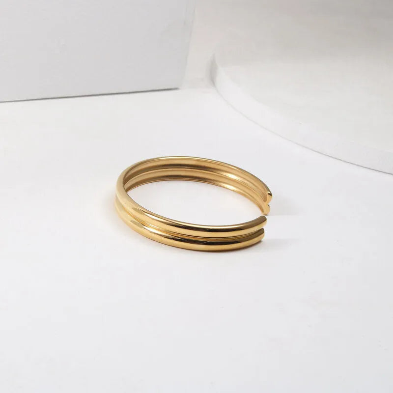 Gold double curved titanium steel bracelet with inlaid pearls geometric women's accessory