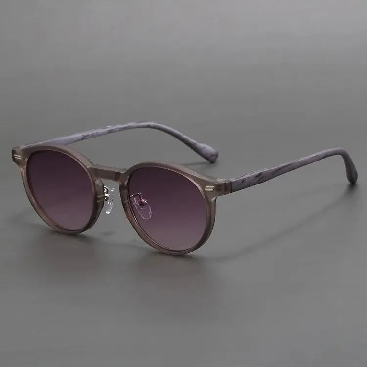 Retro style frosted round rim sunglasses shown in leopard print and grey colour options.