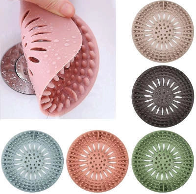 TPR elastomer floor drain cover in blue, green, pink, and grey colours