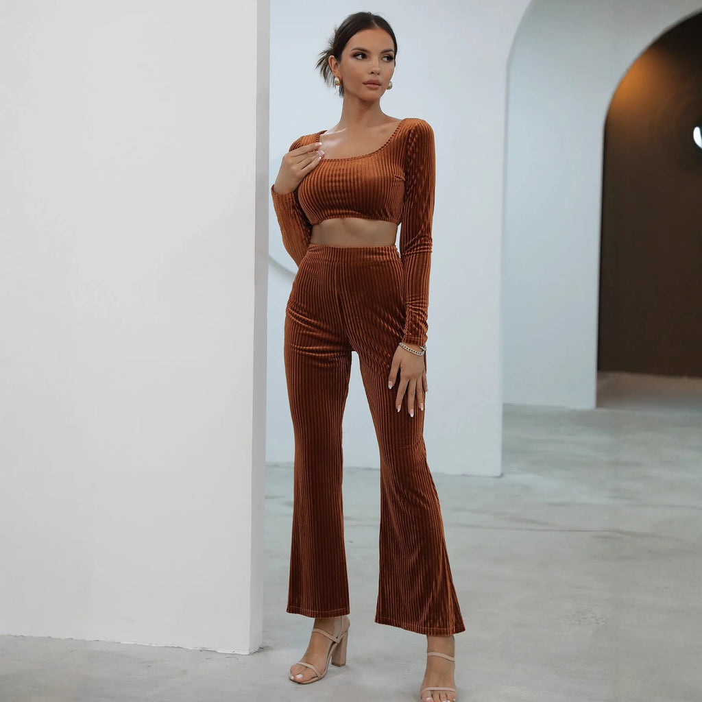 Caramel coloured long sleeve sweater and trouser casual set laid flat