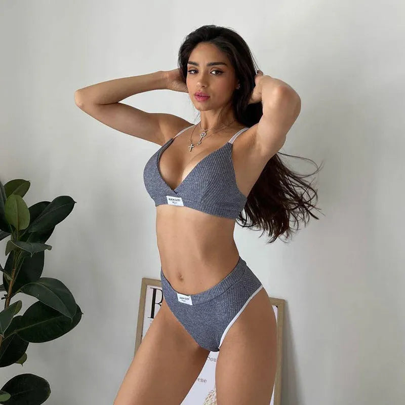 Women's embroidery contrast binding bikini set in black, gray, or white with sleeveless design and shorts